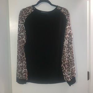 Black shirt with sheer cheetah print sleeves